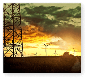 Power transmission towers and wind turbines